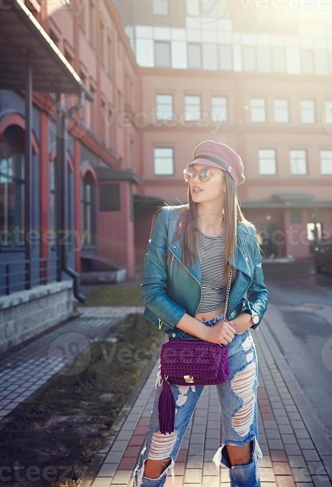 fashion model posing in city. photo