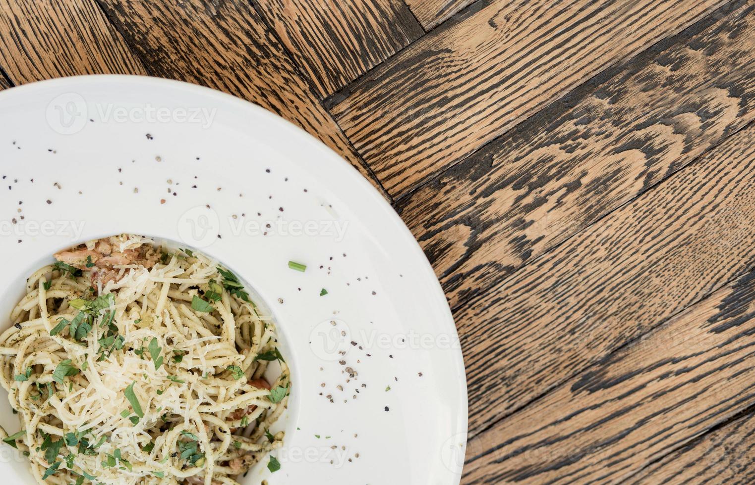 Plate with tasty pasta and cheese. photo