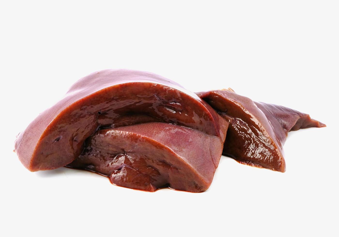 pile of beef liver on white background photo