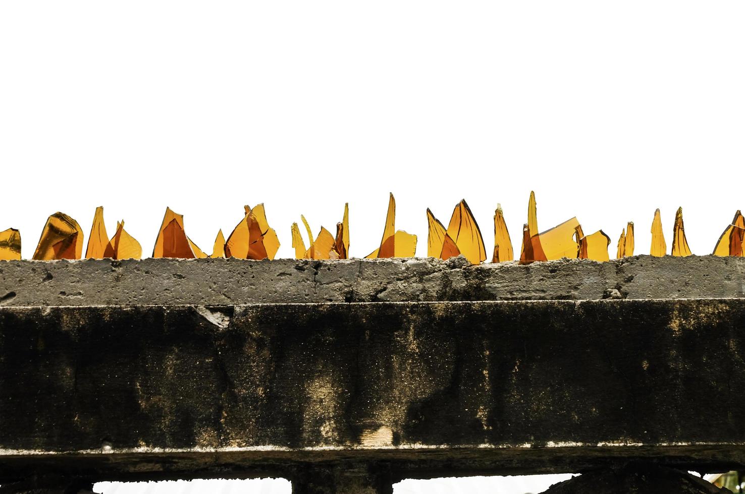 fence with sharp broken glass photo