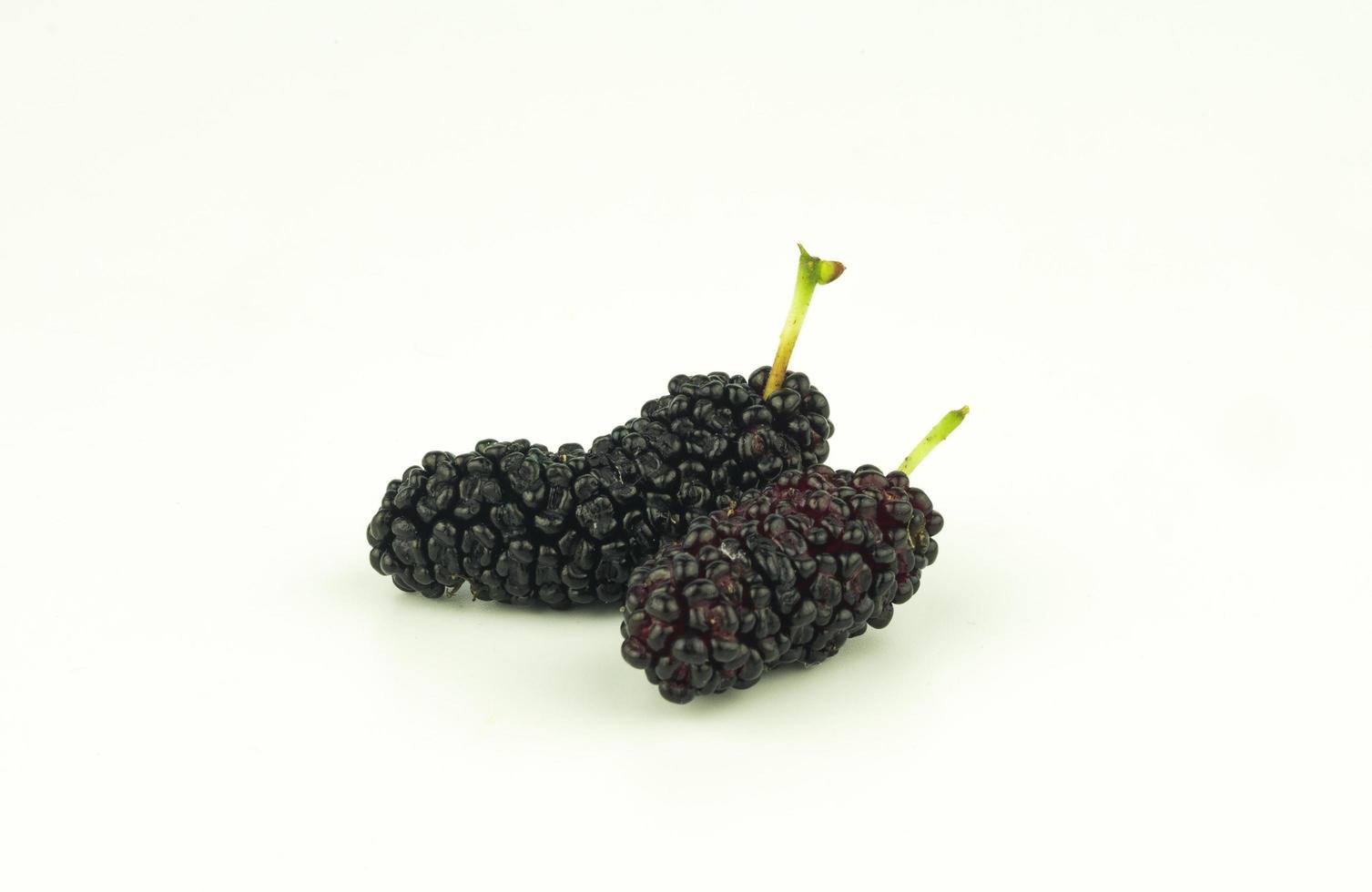 ripe mulberry fruit on white background photo