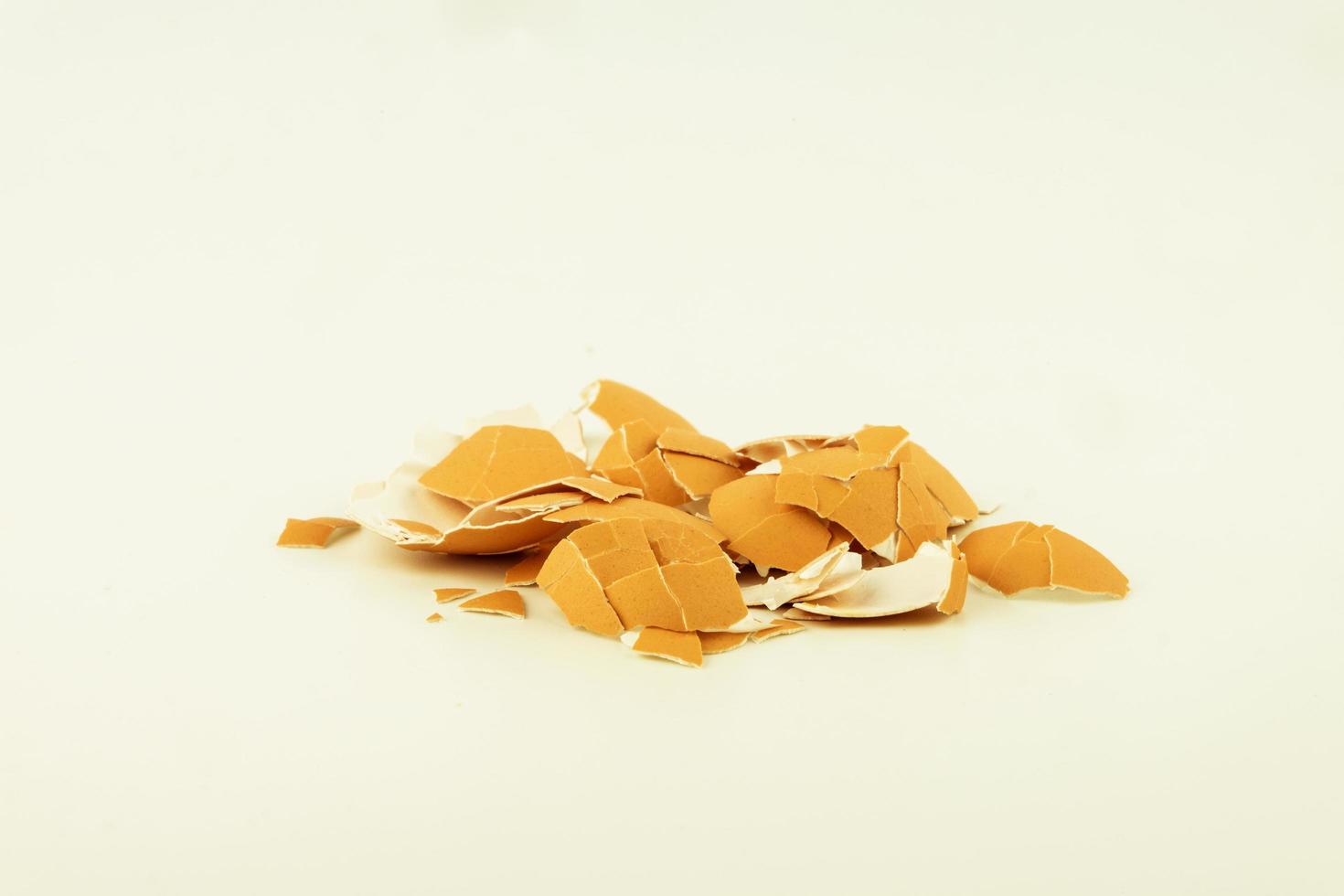 broken egg shell on white background photo