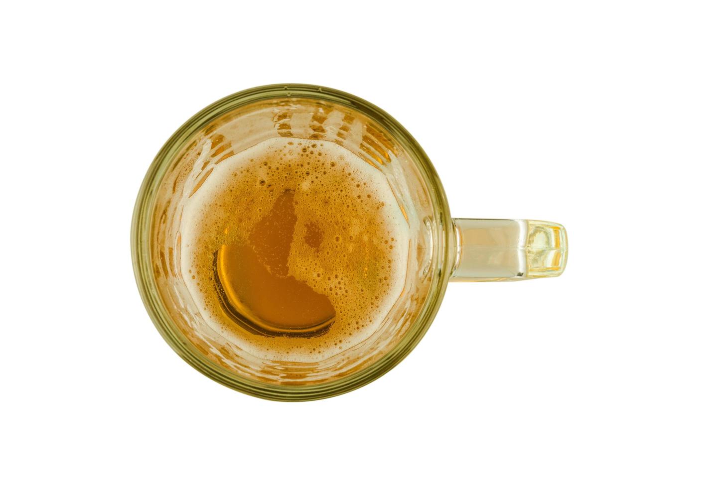 top view of beer mug on white background photo