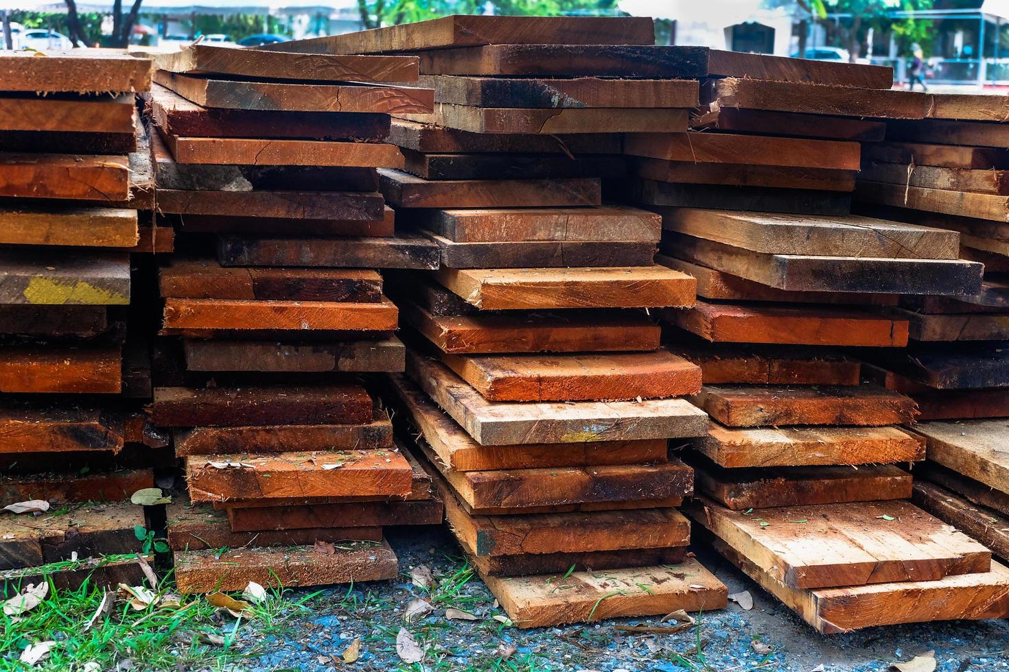 stack of wooden studs in lumber yard photo