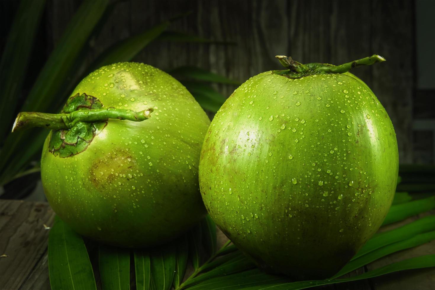 fresh coconut fruit with water dropping photo