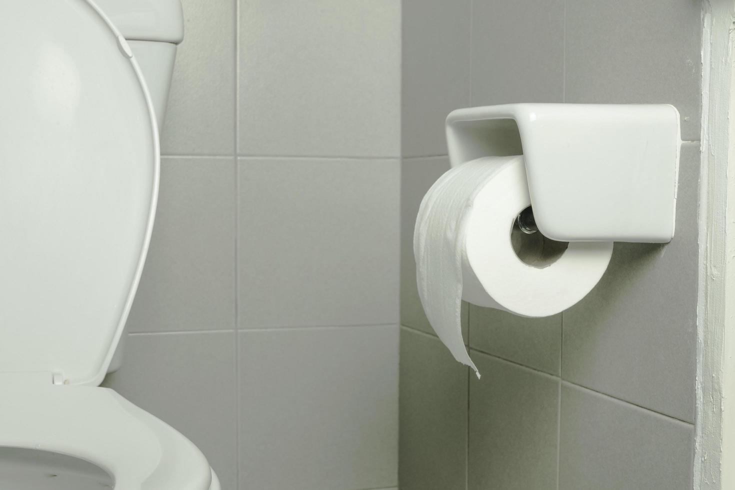close up toilet paper in bathroom photo