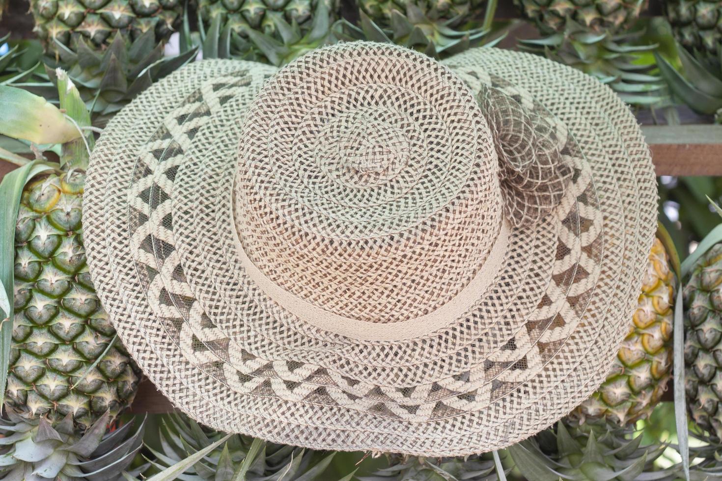 The hat of the pineapple trader. Wear to protect the from sunlight. photo