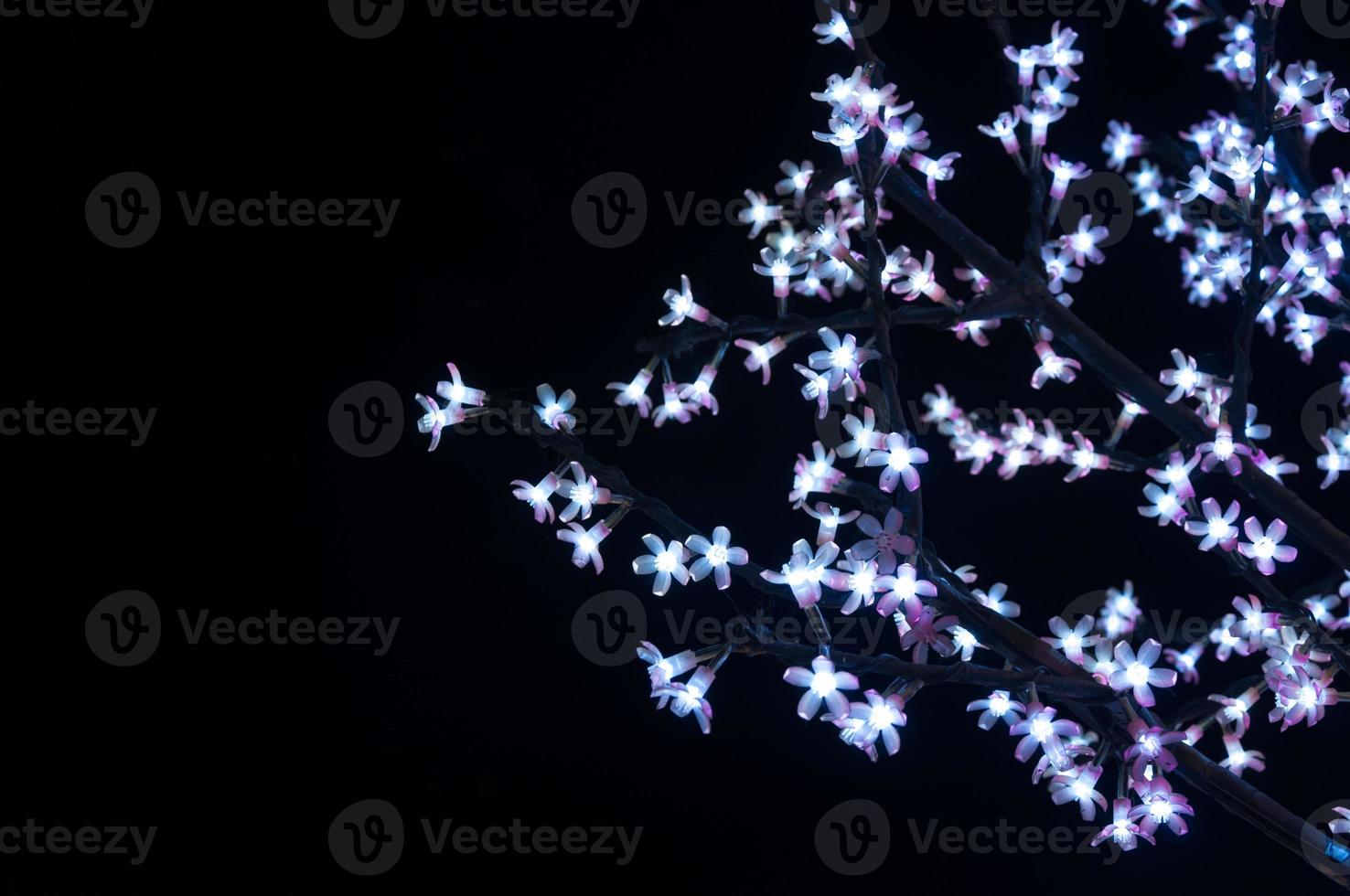 Christmas lanterns in the shape of flowers on a black background,for happy new year background photo