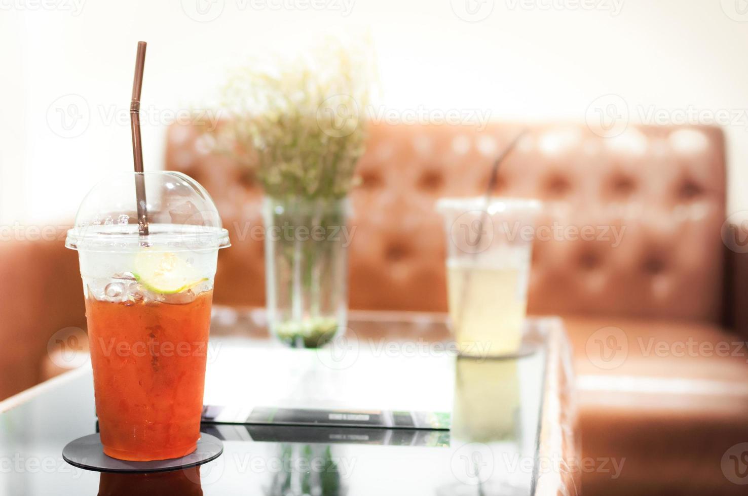 iced honey lemon tea on the table in cafe with copy-space,Summer drinks with ice photo