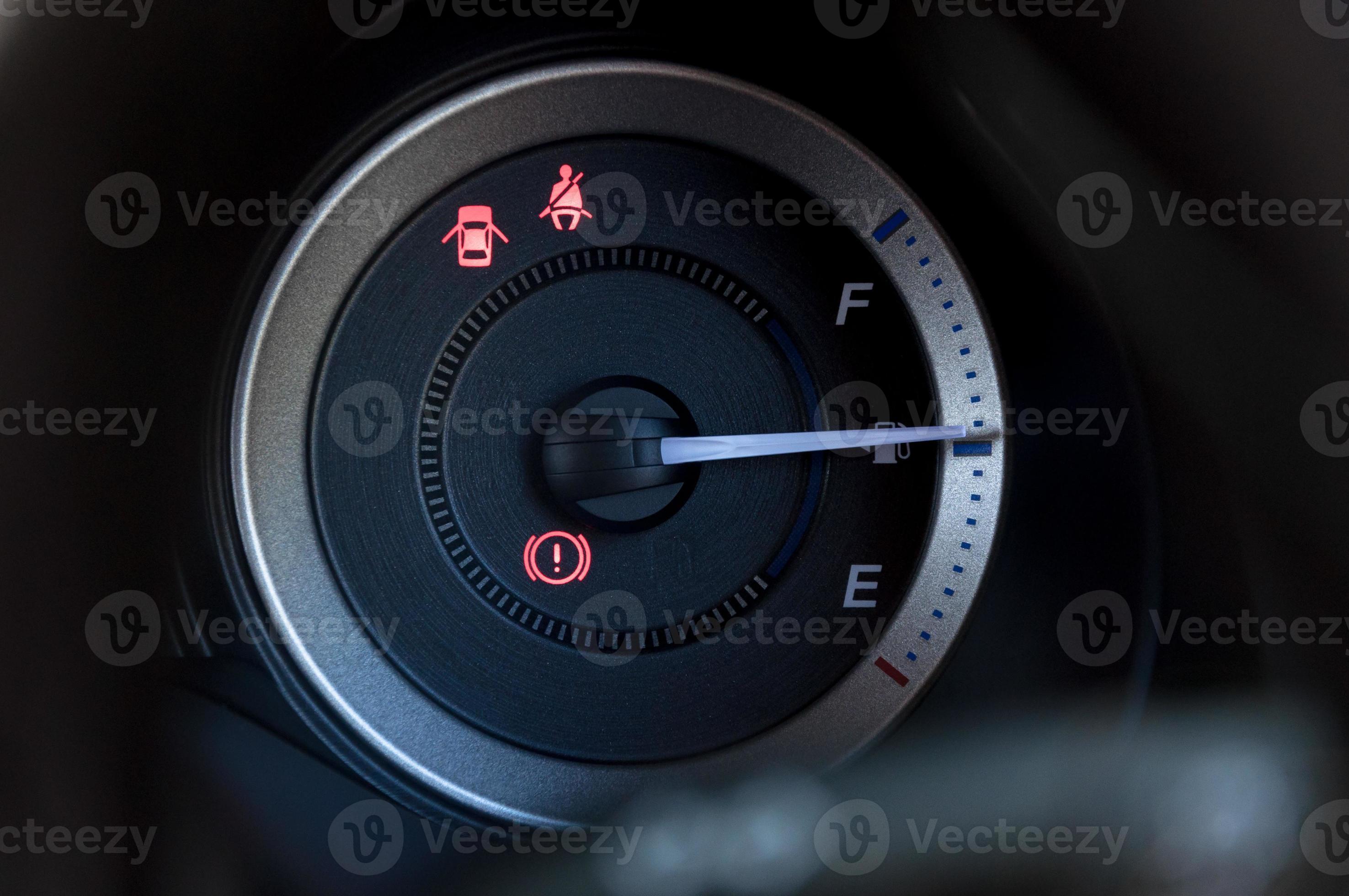 detail with the gauges on the dashboard of a car 20118454 Stock Photo at Vecteezy