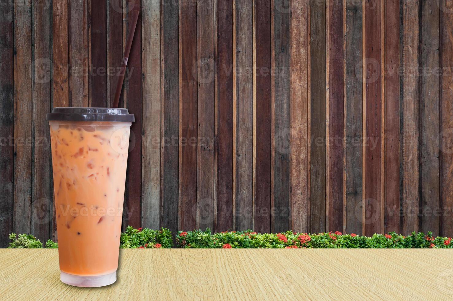 Ice Tea,iced milk tea on wooden background ,Summer drinks with ice photo