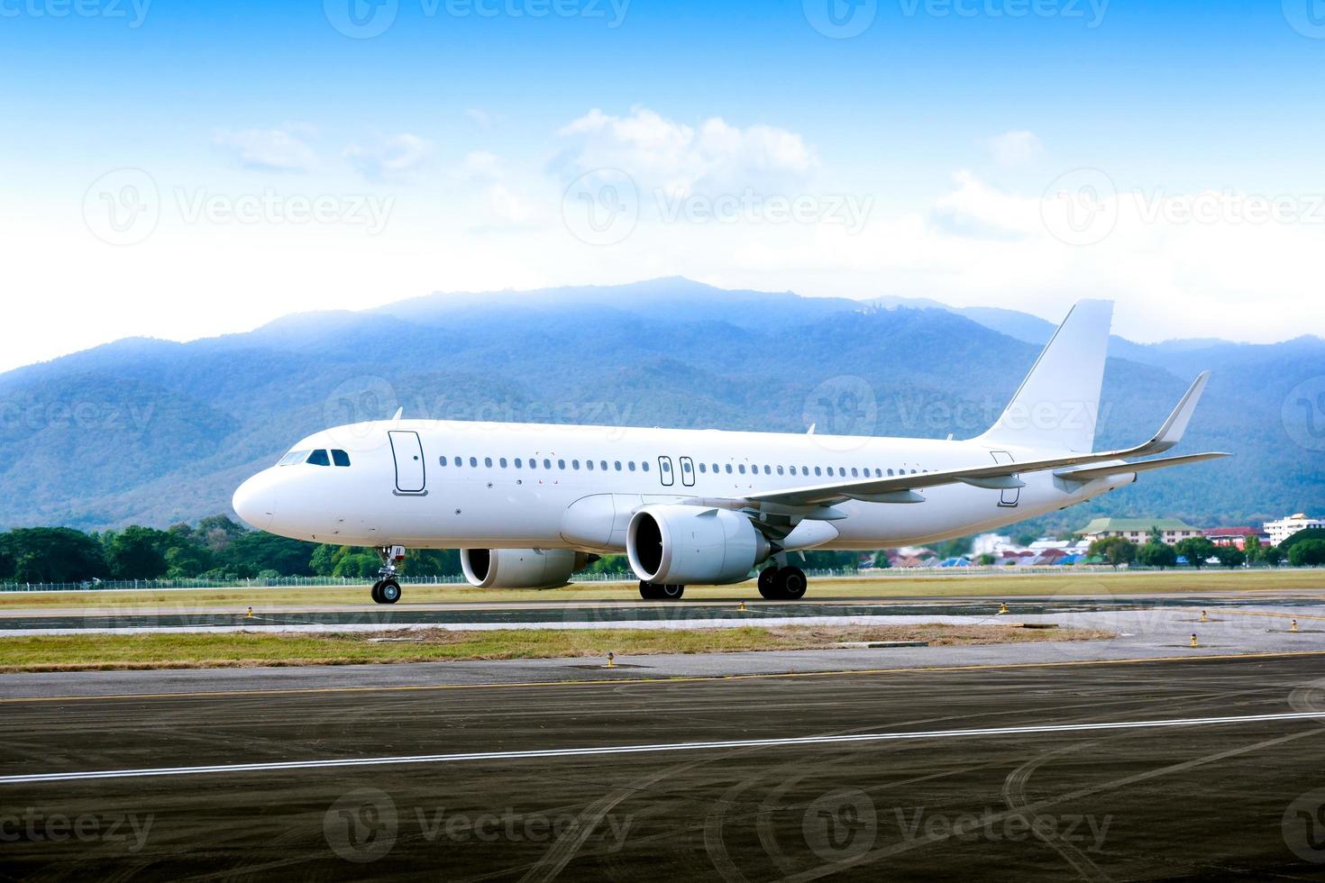 Commercial modern white airplane with nice sky,Happy journey and holidays concept. Aviation and transportation. photo