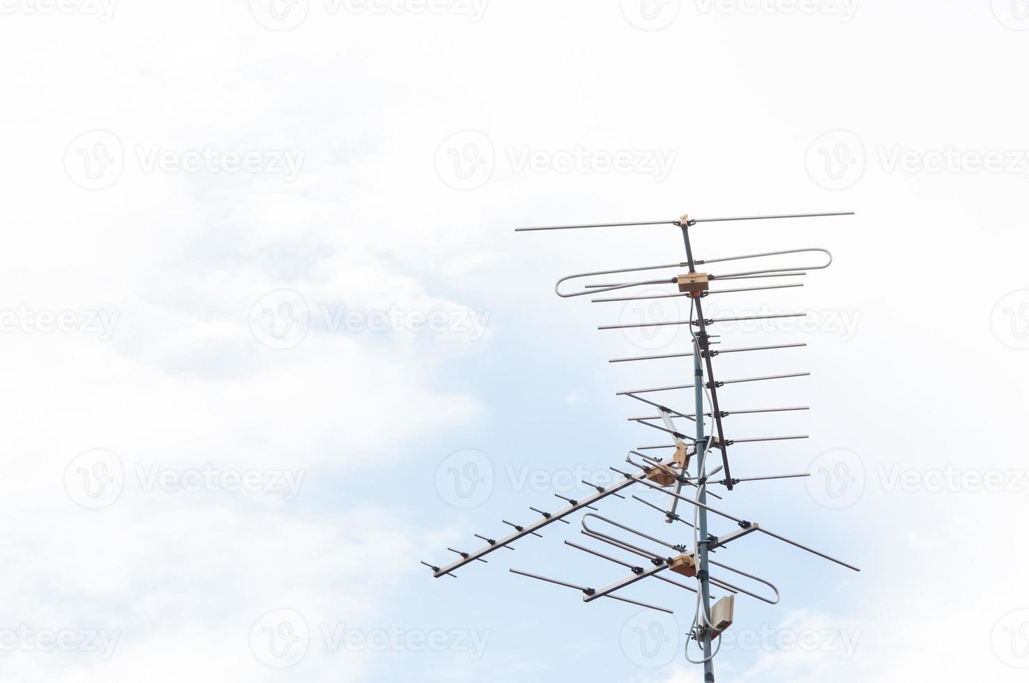 television antenna on Cloud blue sky background photo