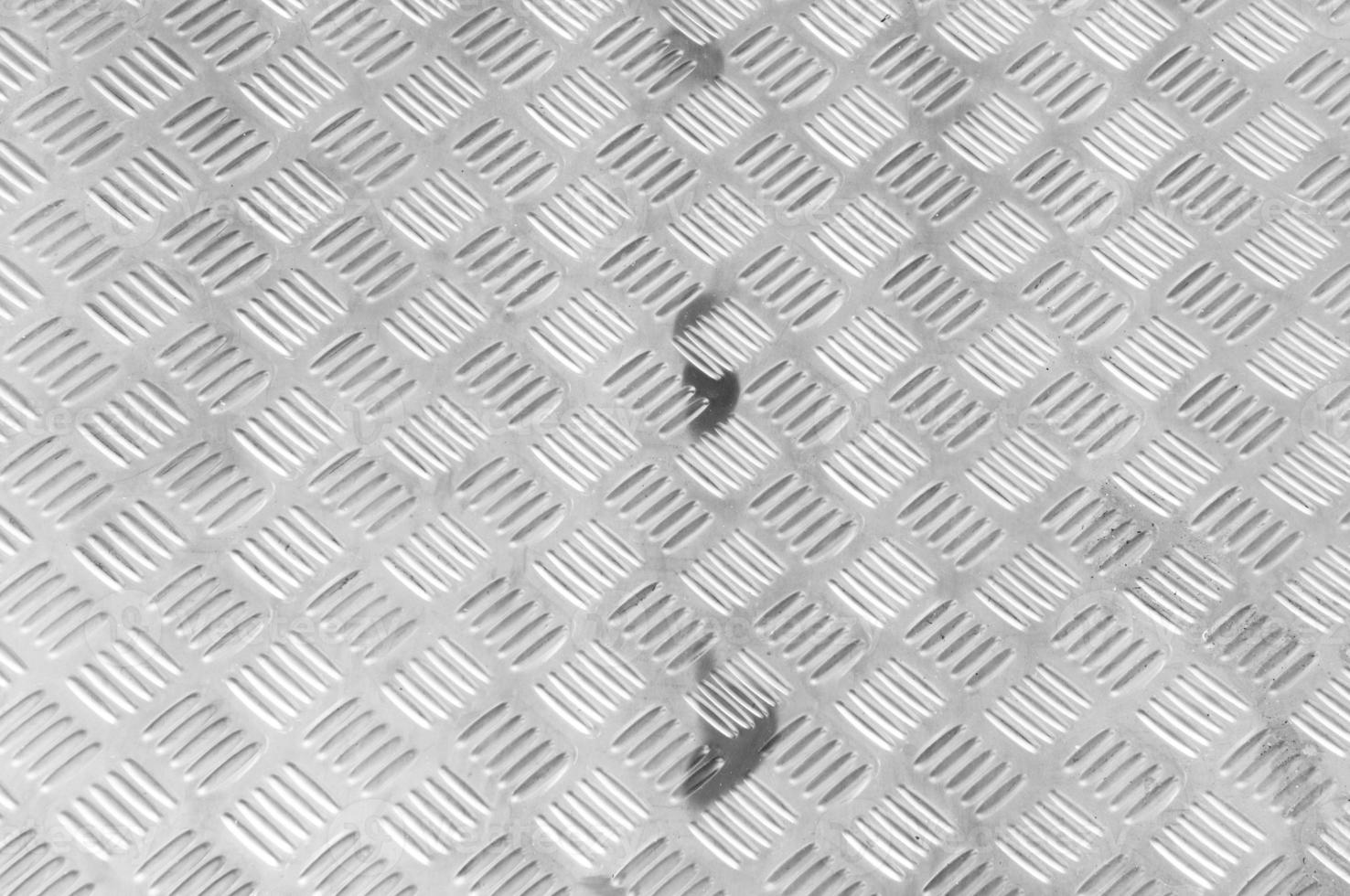A background of old metal diamond plate,Metal texture background photo