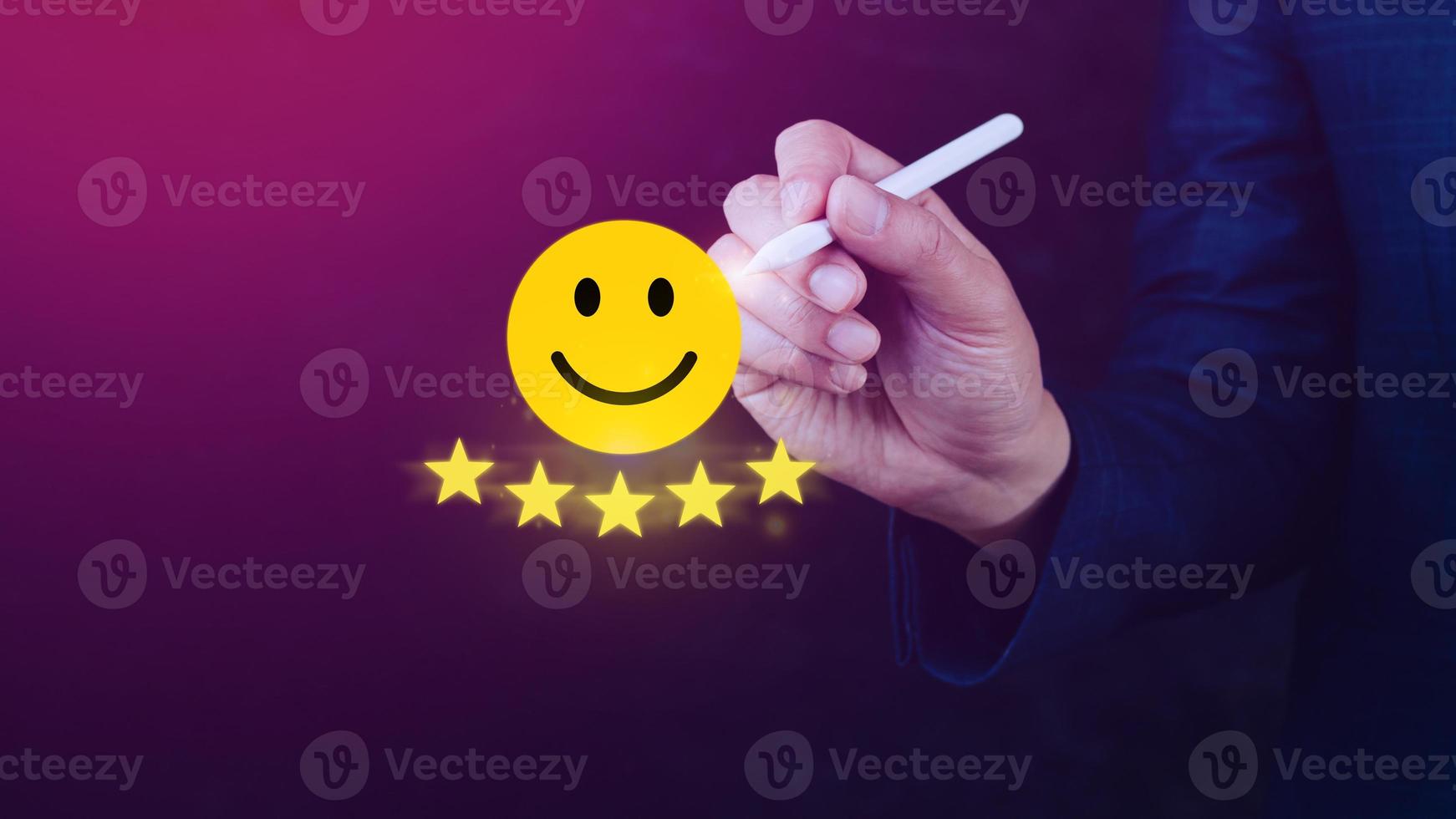 Customer services best excellent business rating experience, Positive Review and Feedback, Satisfaction survey concept. Hand of a businessman show happy smile face with five star. photo