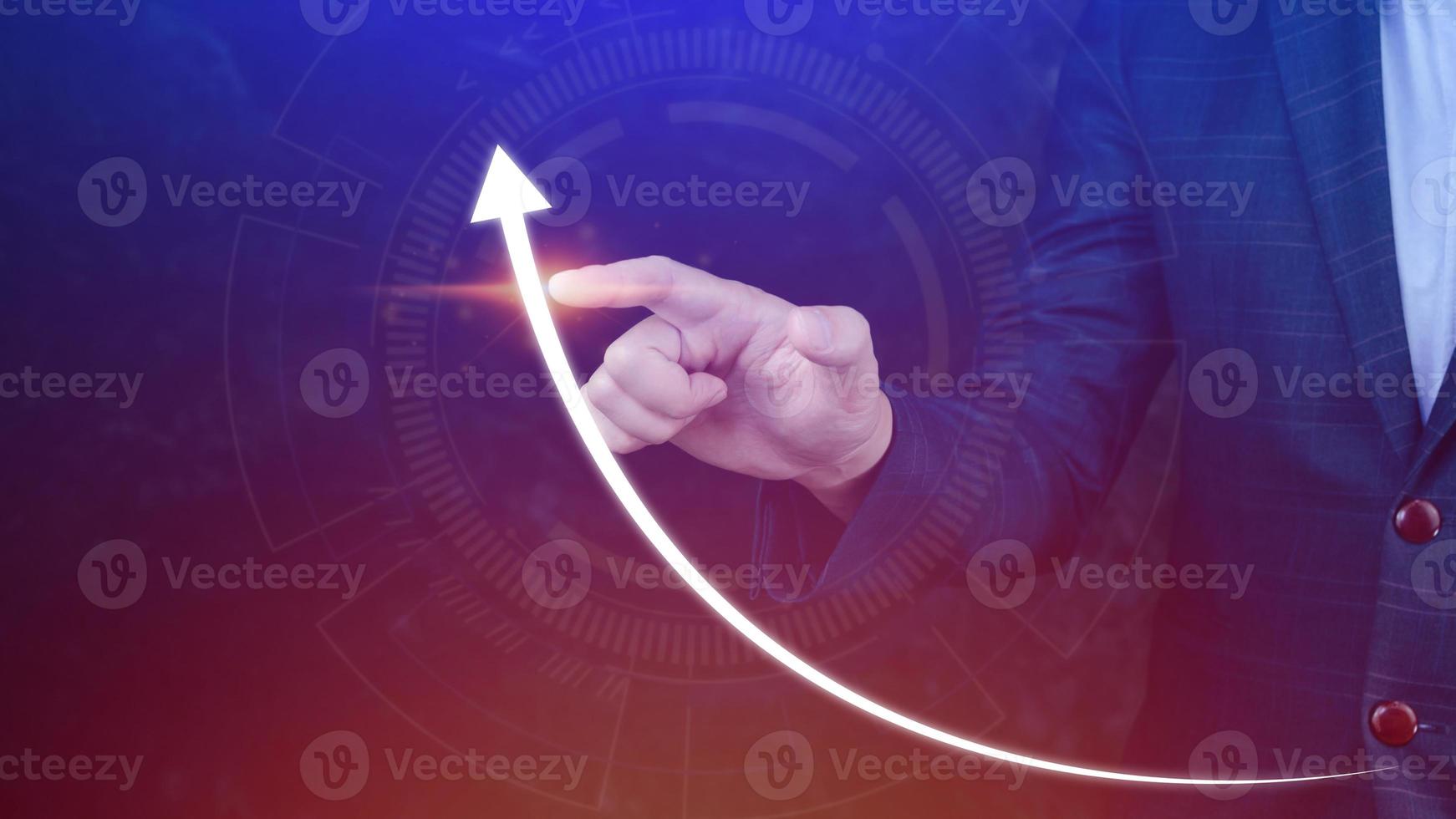 Businessman pointing touching growth on up arrow chart icon, hands touch the up arrow that represents profit rises, monetary growth photo