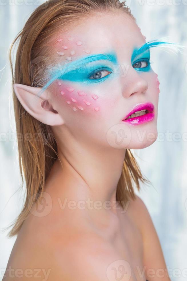 Adorable girl in the image of an elf photo