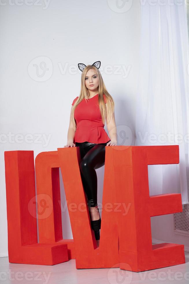 Nice woman posing in studio photo