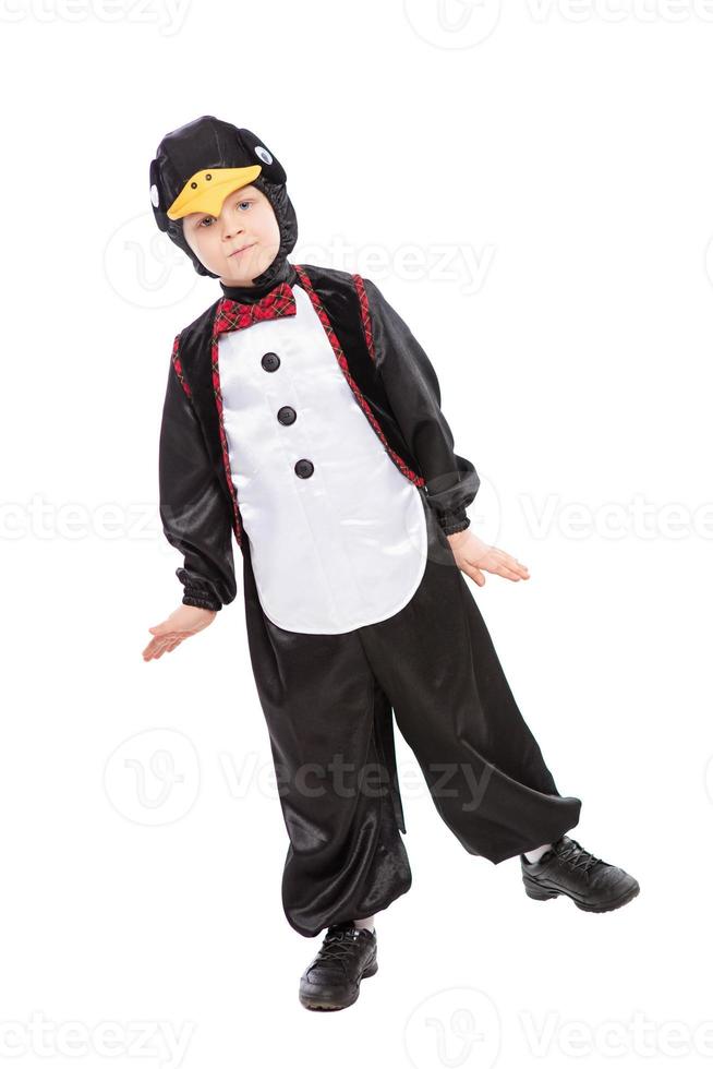 Playful boy posing in studio photo