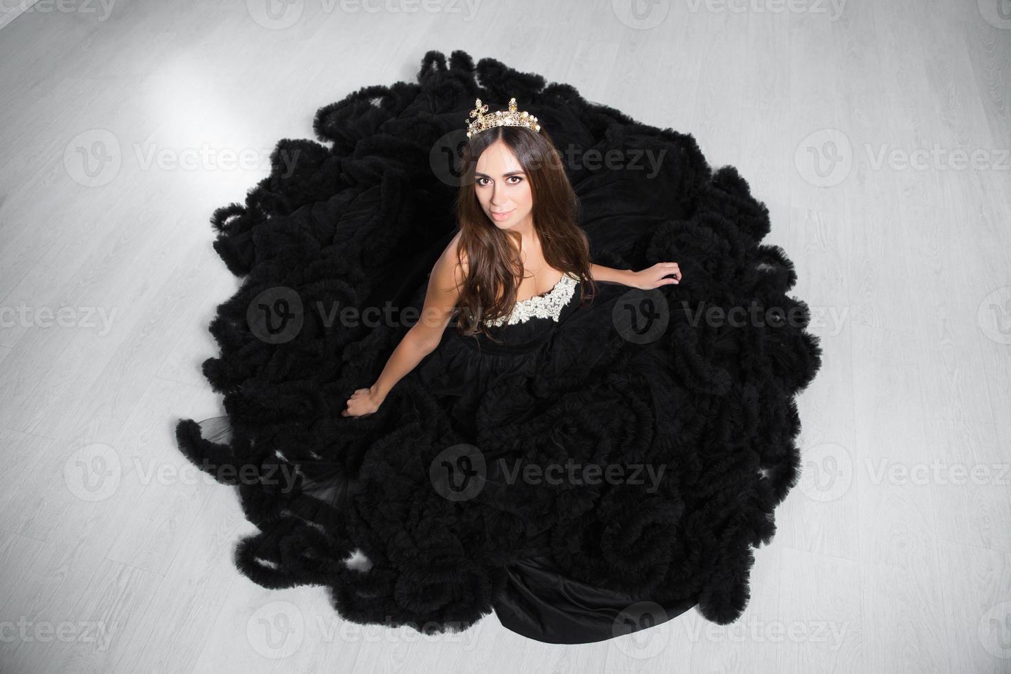 Alluring young woman poses in a studio photo