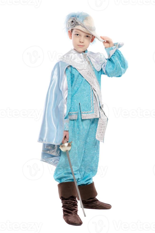 Charming boy in a musketeer costume photo
