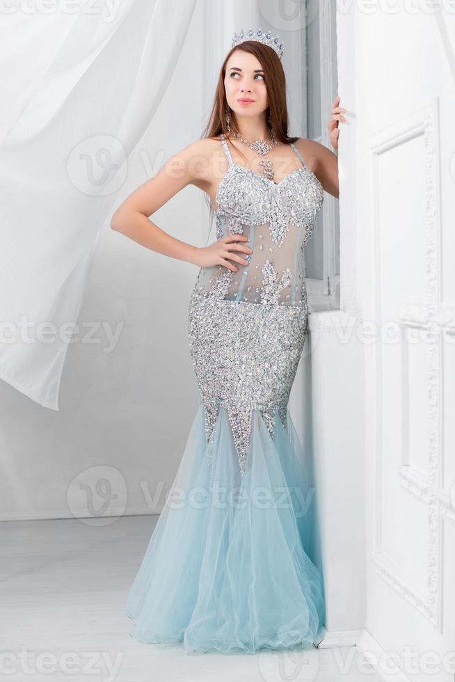 Lovely young woman posing in a studio photo