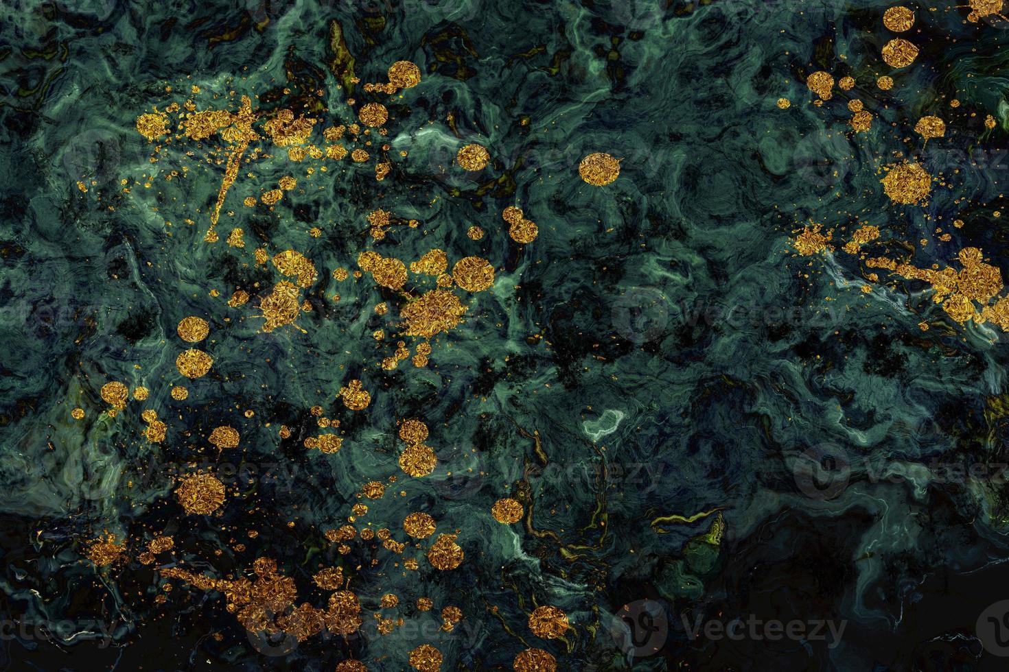 The texture of dark green marble with white veins and golden paint spots. Abstract green marble with gold. Glossy marble stone texture for digital wall tile design photo