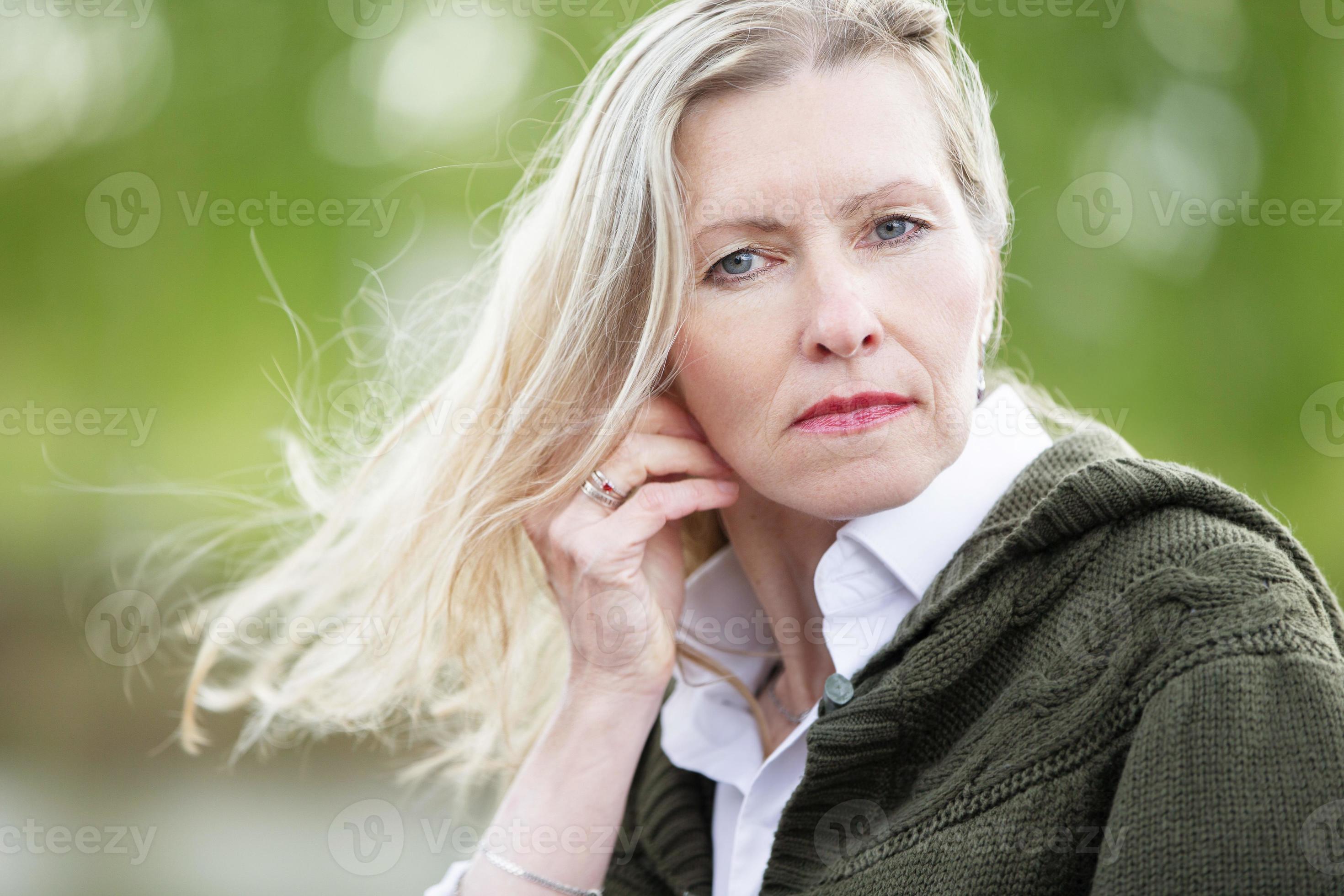 Portrait of a beautiful elderly blonde woman of European appearance