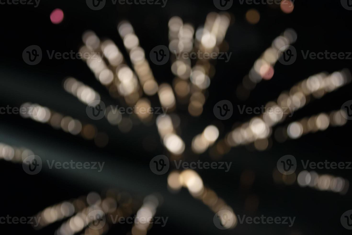 On a black background bokeh from explosions of colorful fireworks. photo