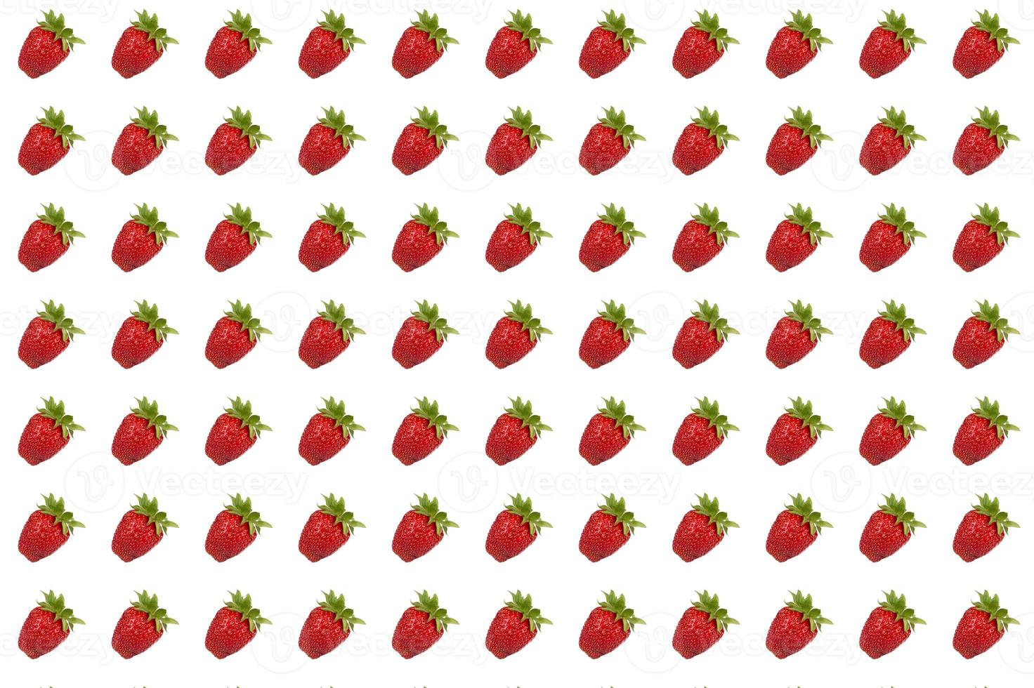 Seamless ordered strawberry texture. Lots of sweet ripe strawberries on a white background photo
