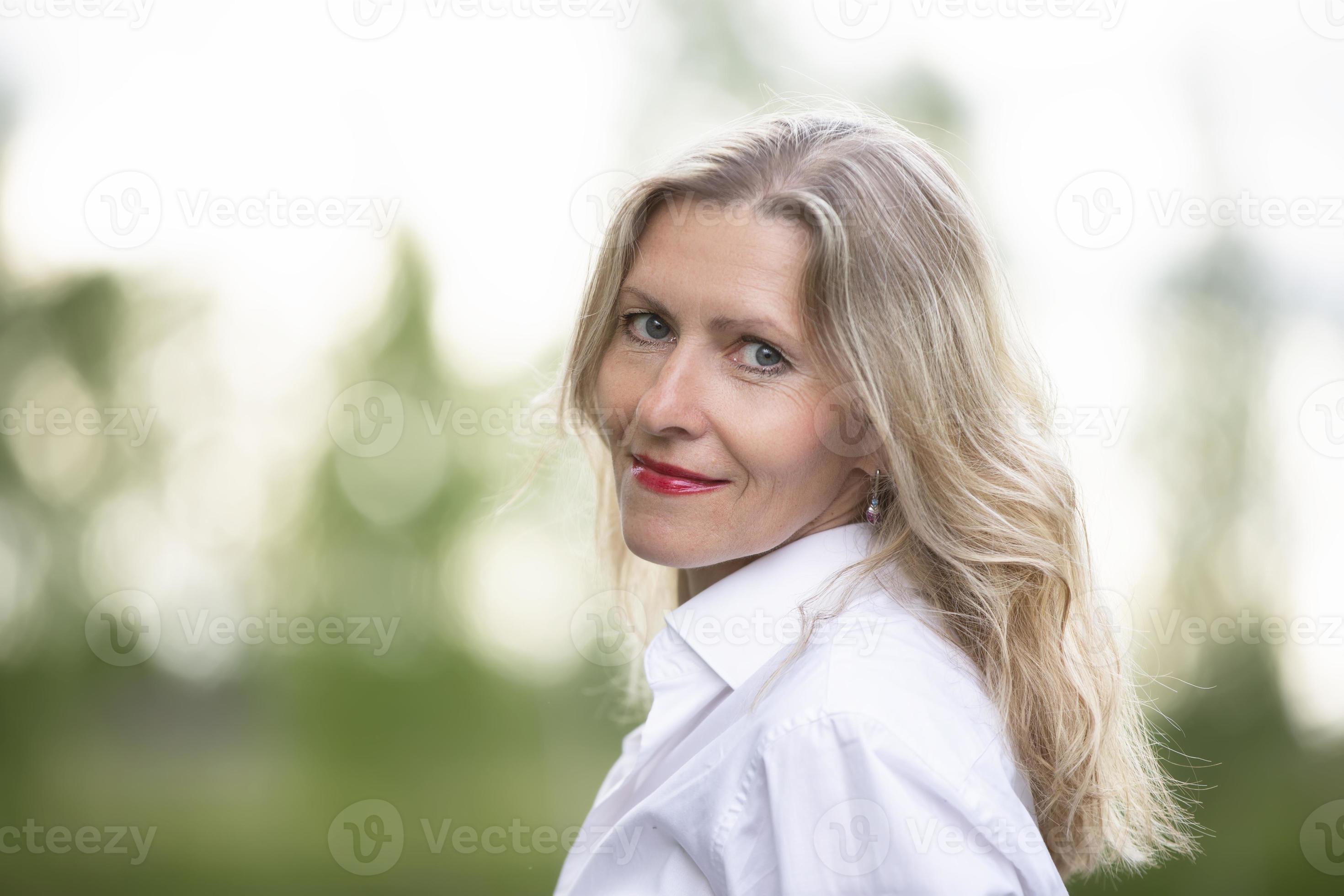 Portrait of a beautiful European middle-aged woman. Fifty-year-old