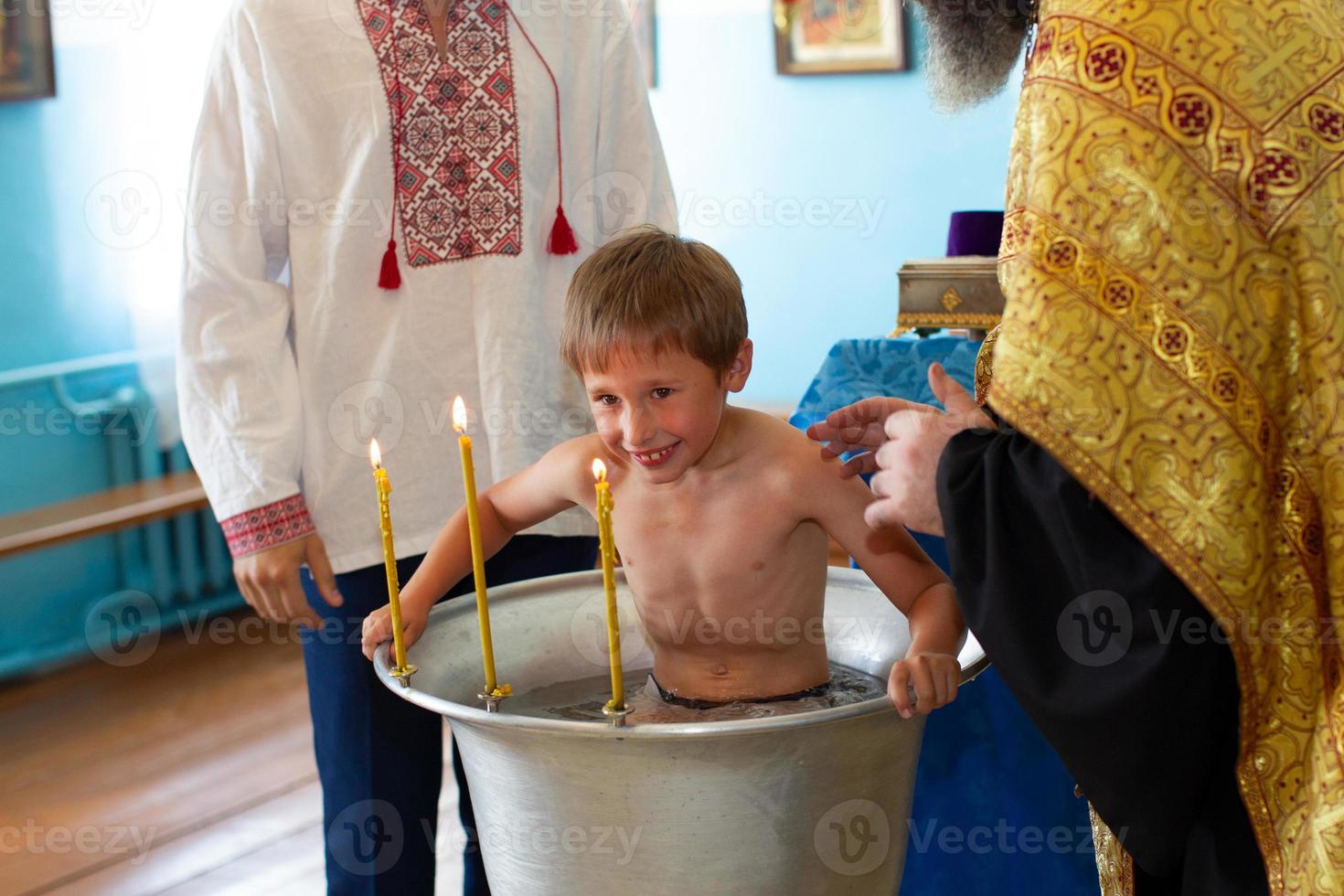 Orthodox baptism of a Belarusian child in a church. photo