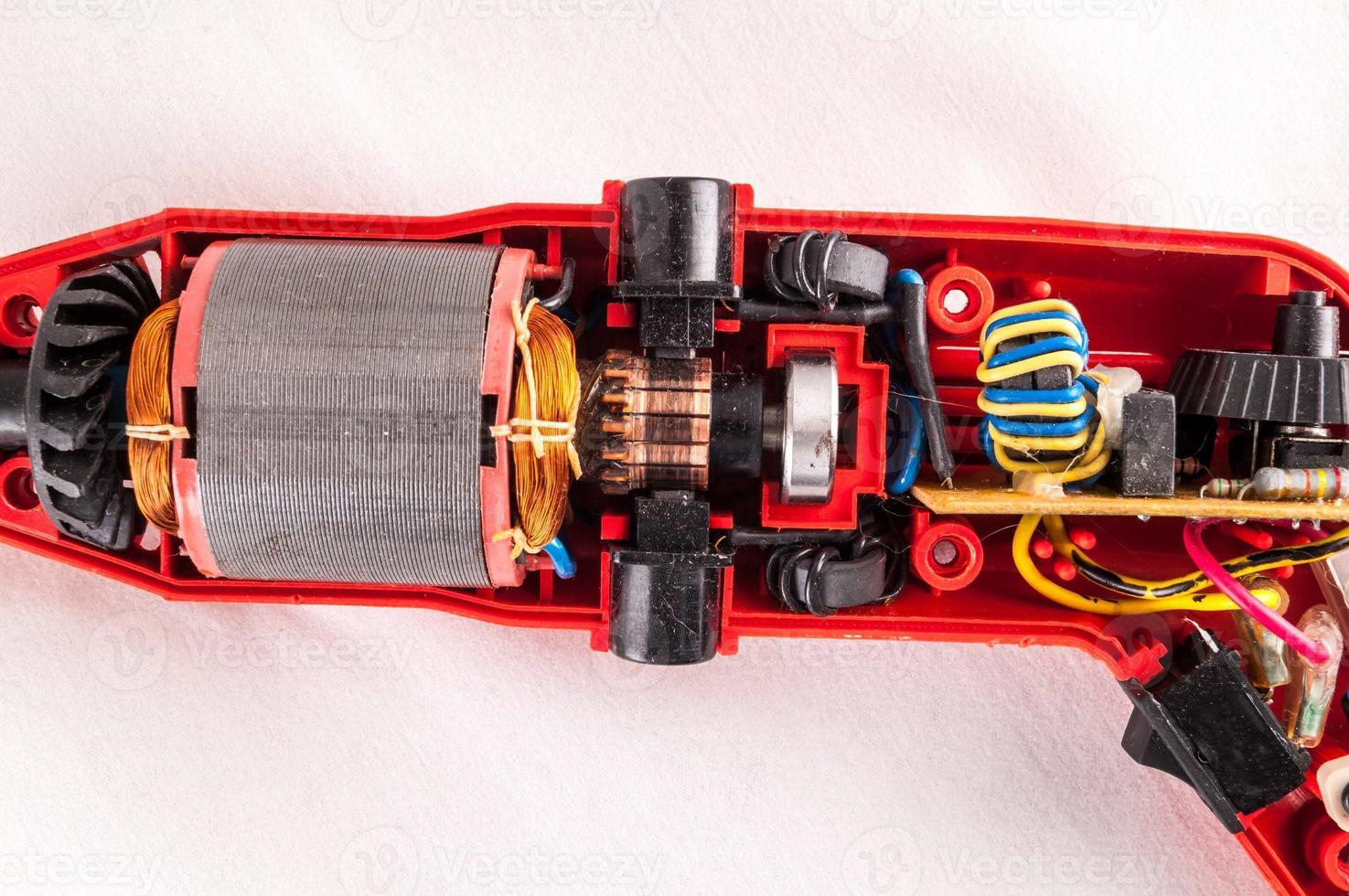 Red drill on white photo
