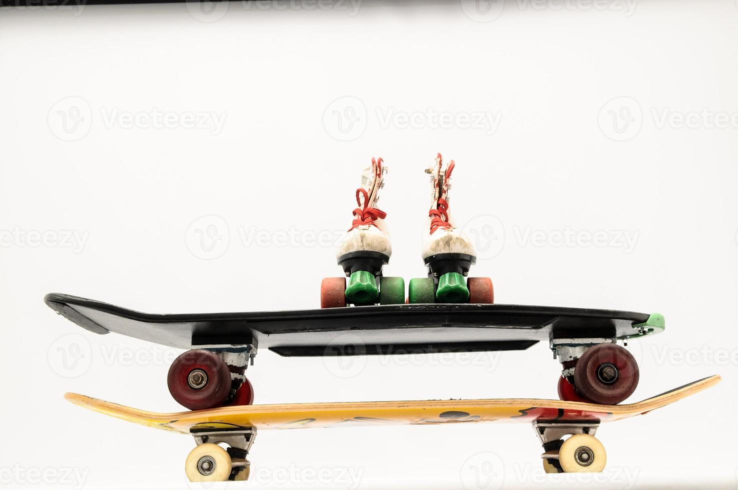 Skateboard and roller skate photo