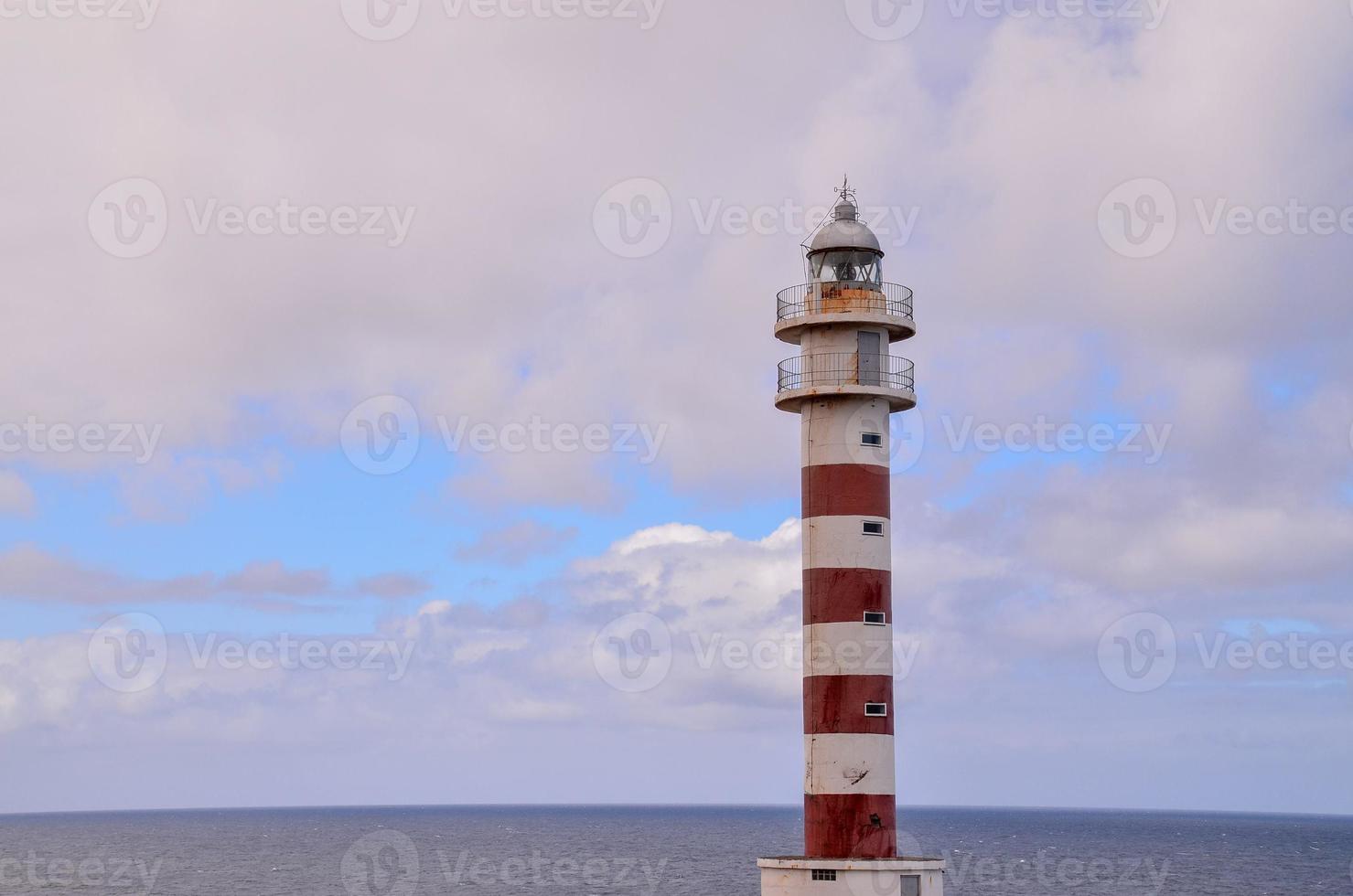 Red and white lighthouse photo