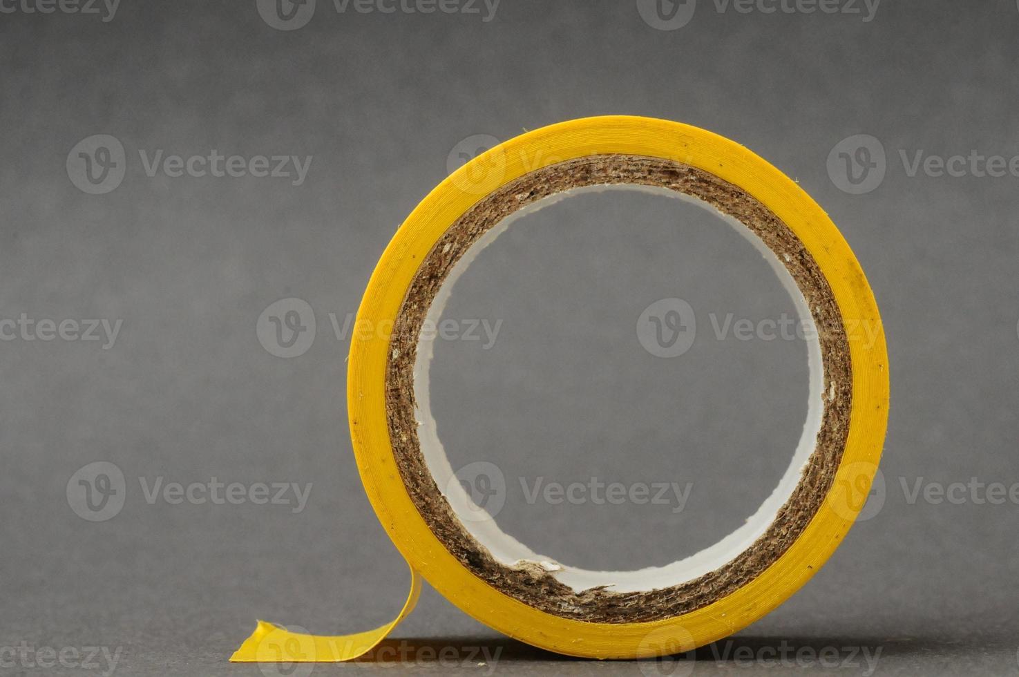 Yellow roll of tape photo