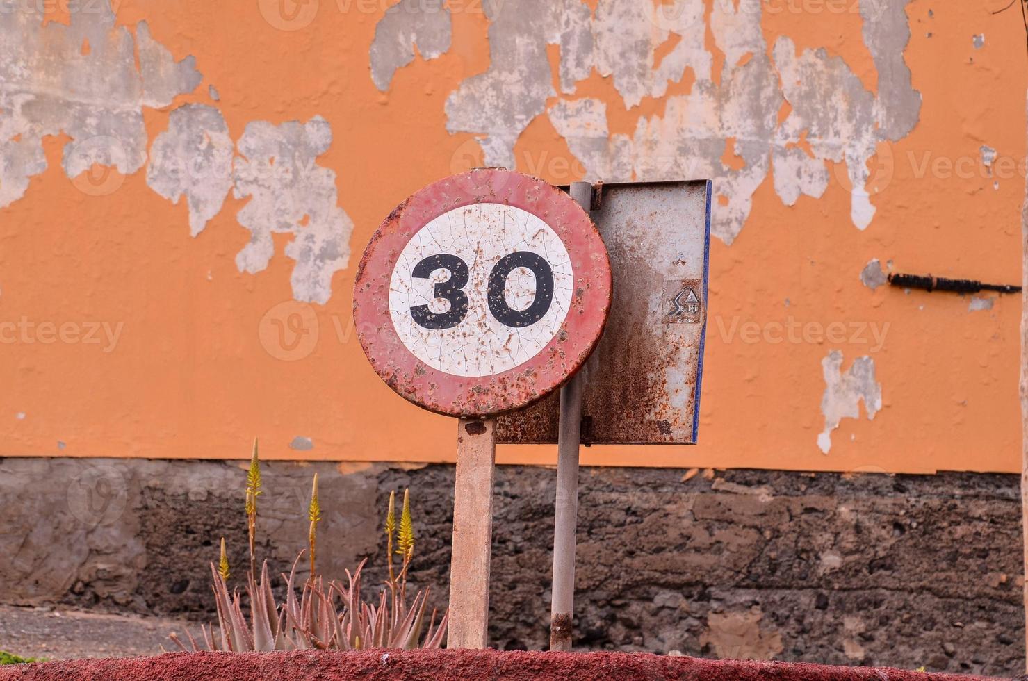 Old speed limit sign photo