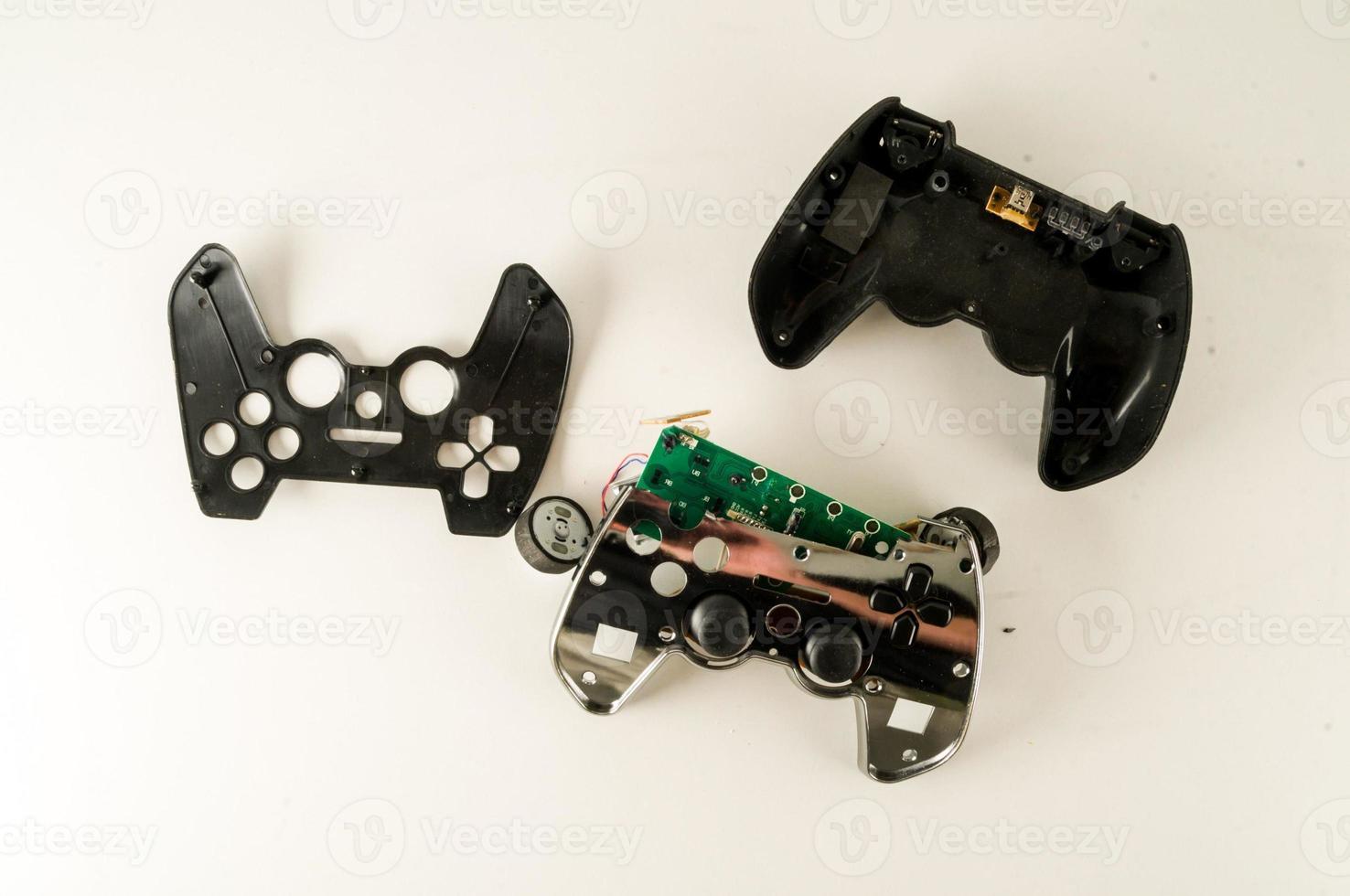 Broken game controllers photo