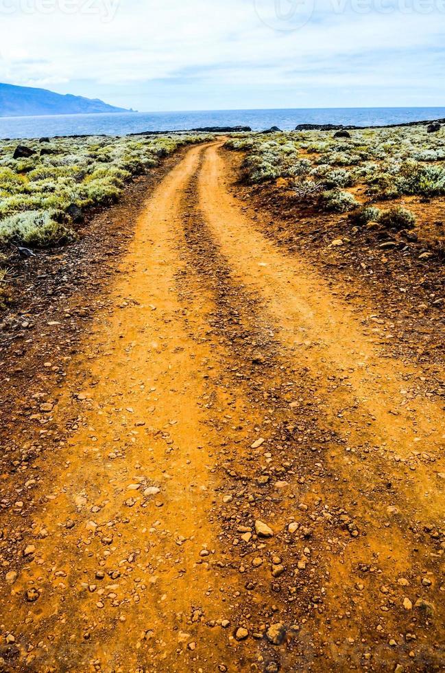 Dirt road to the sea photo