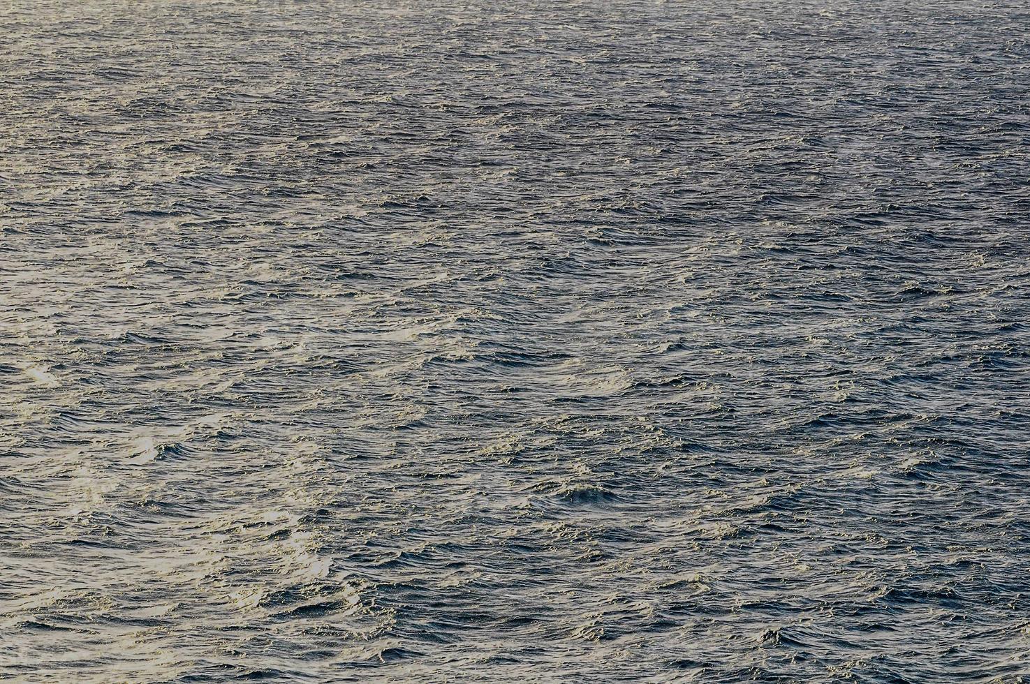 Calm sea surface photo