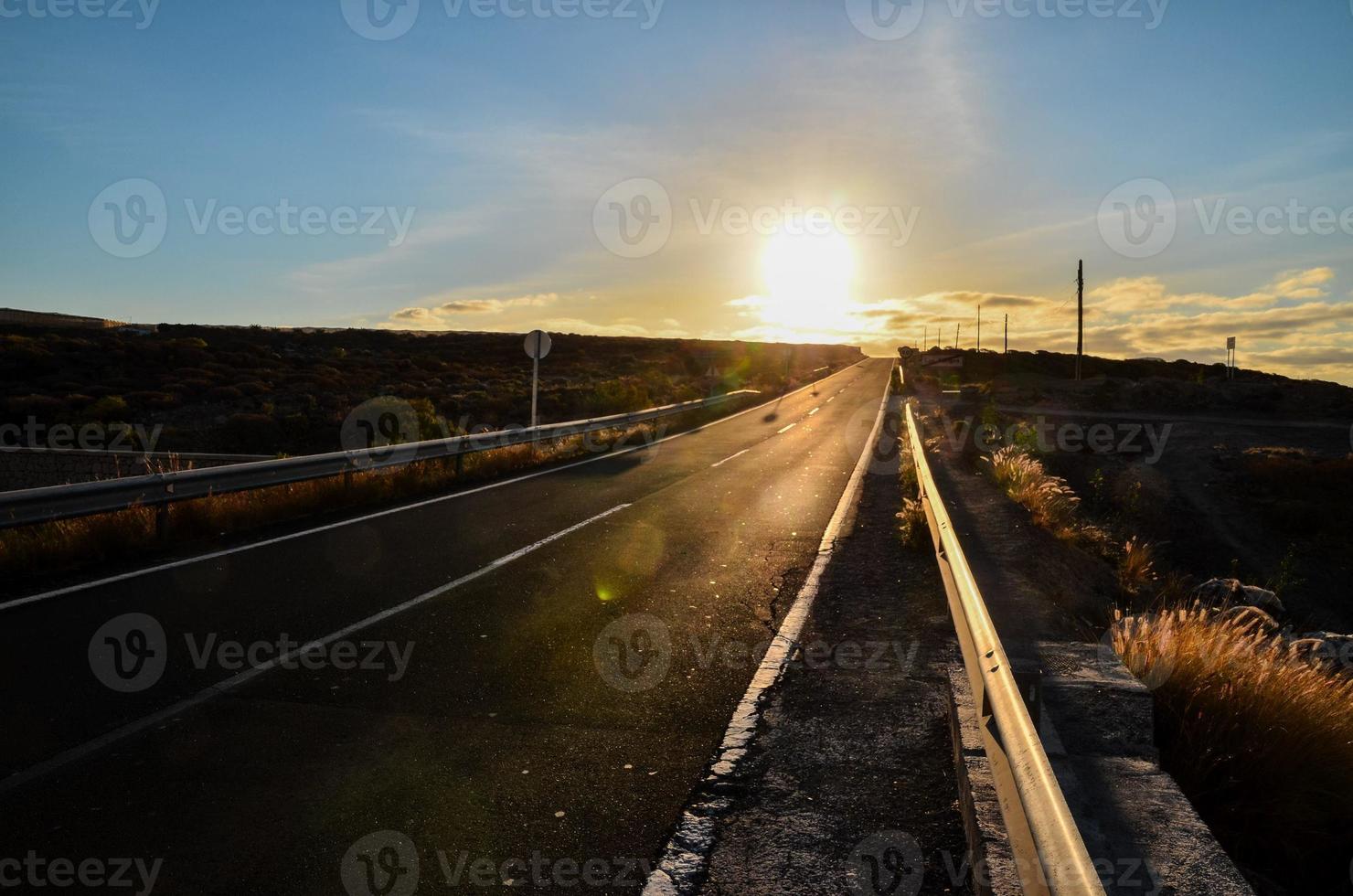 Road through the scenic landscape photo