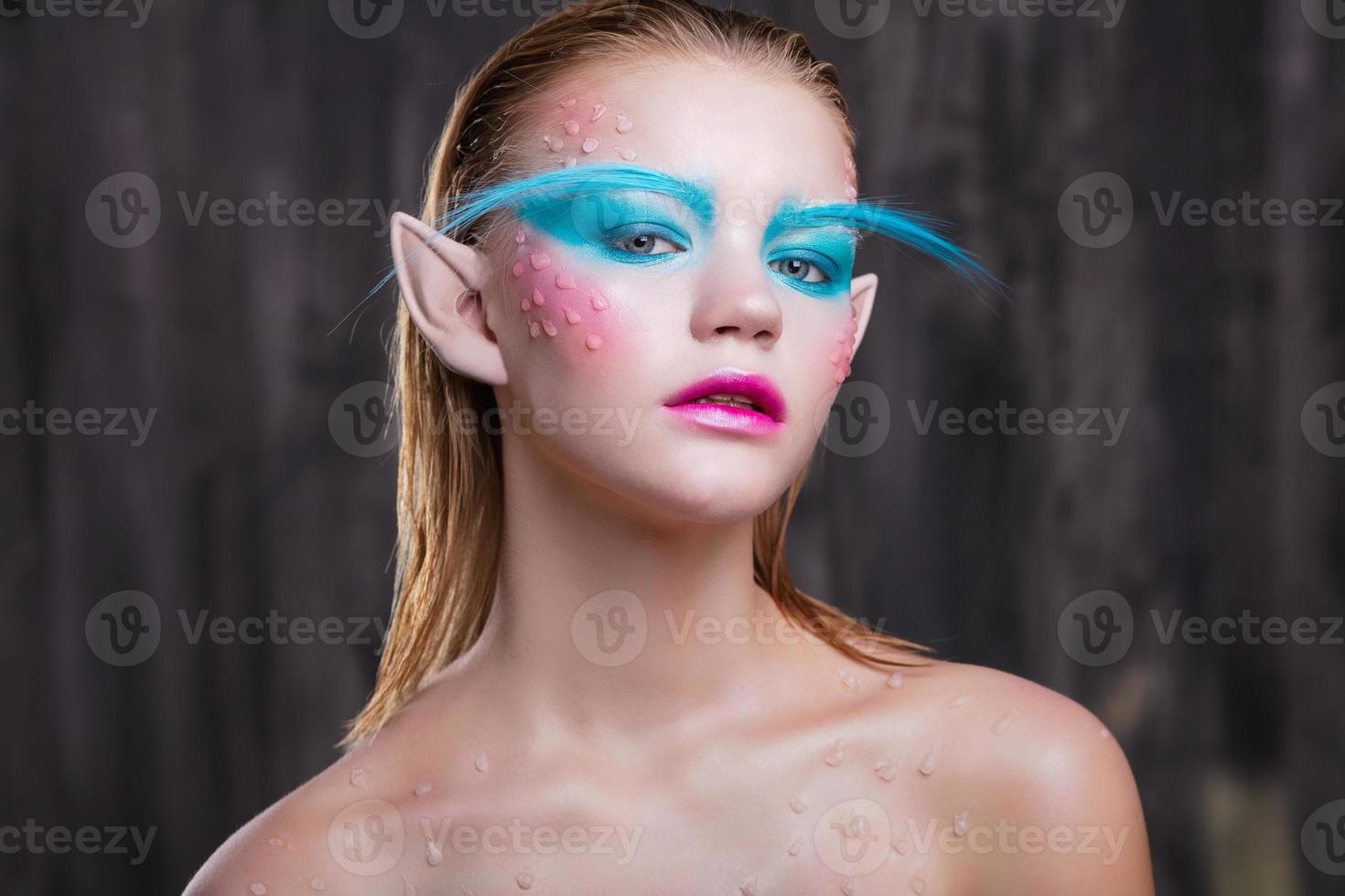 Young cute girl in the image of an elf photo