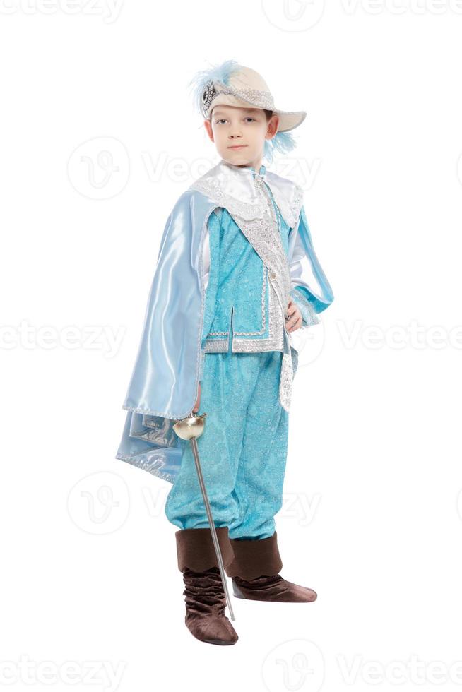 Nice boy in a musketeer costume photo