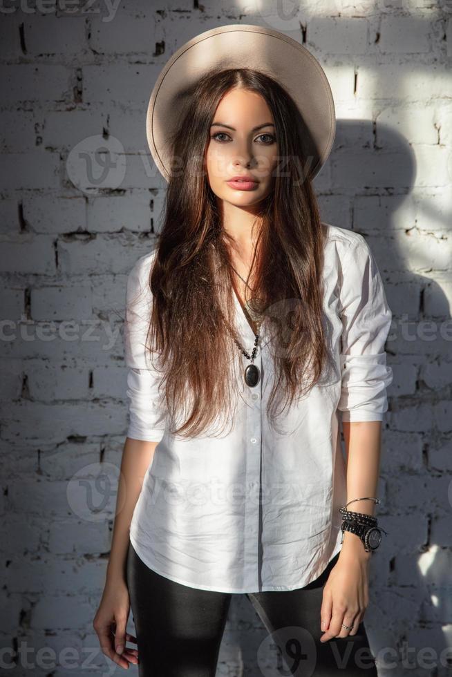 Nice woman posing in studio photo
