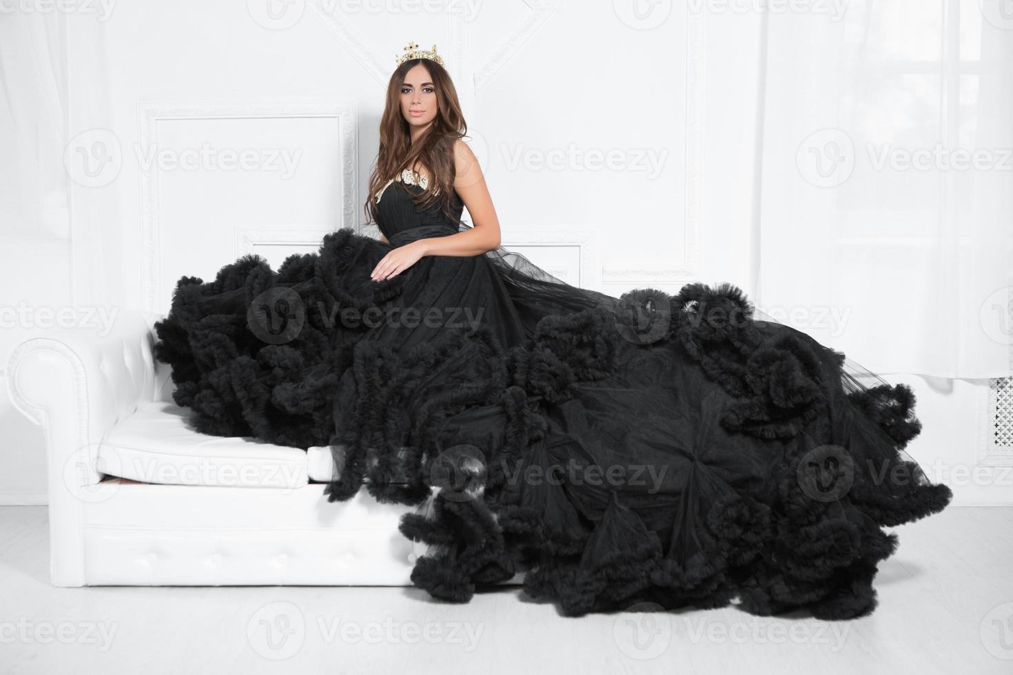 Nice young woman poses in a studio photo