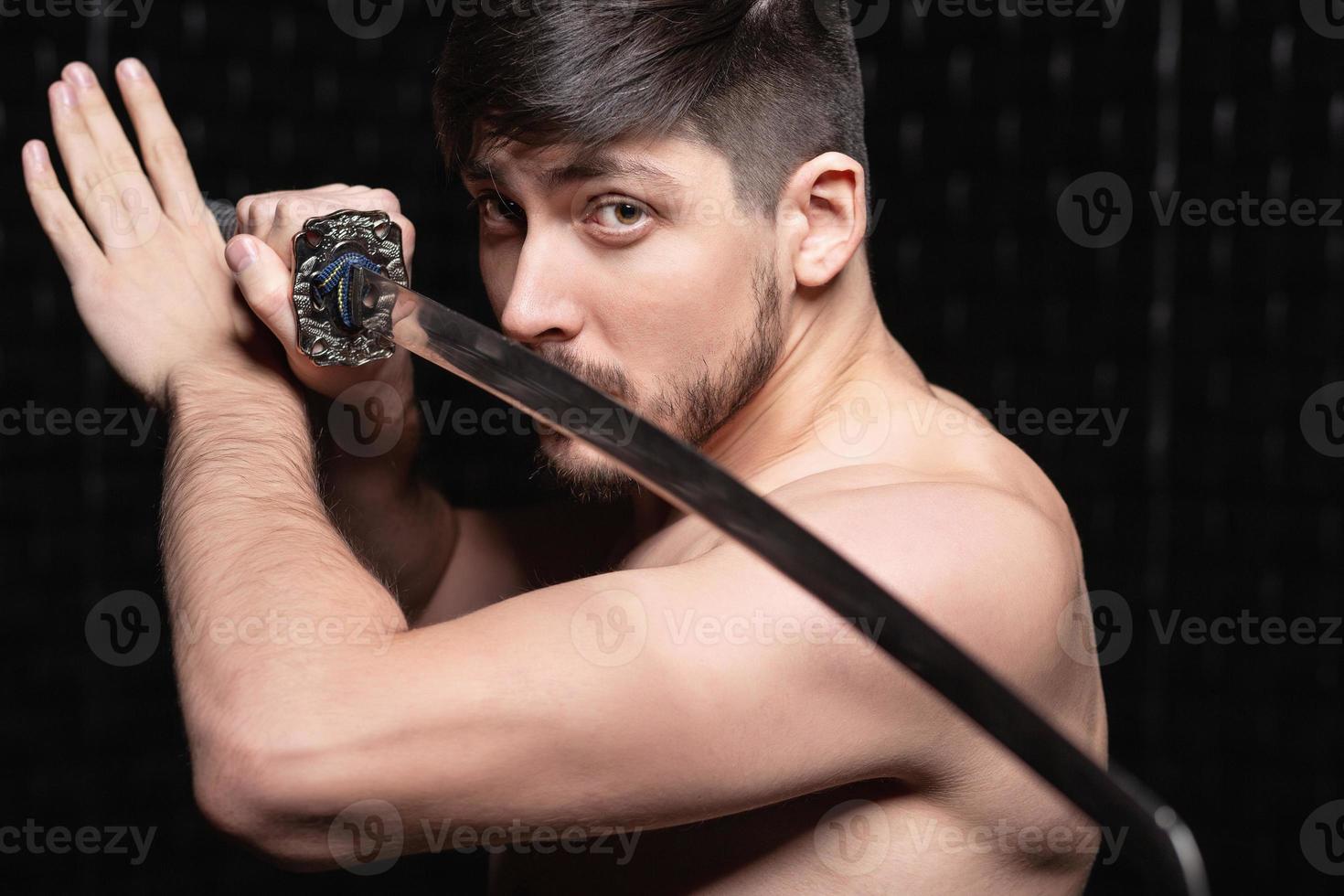 Portrait of lovely guy posing in studio photo