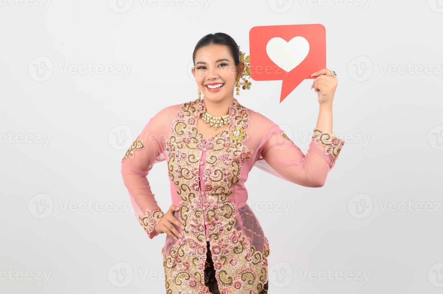 Young beautiful woman dress up in local culture in southern region with speech bubble photo