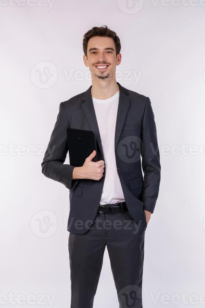 Portrait of attractive cheerful businessman using device app searching web isolated over white color background photo