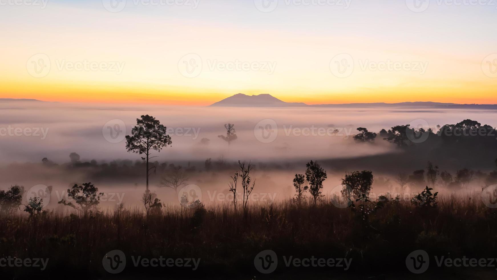 Thung Salaeng Luang National Park,The sun over the mountains and vast grasslands, Phetchabun Province, Thailand photo