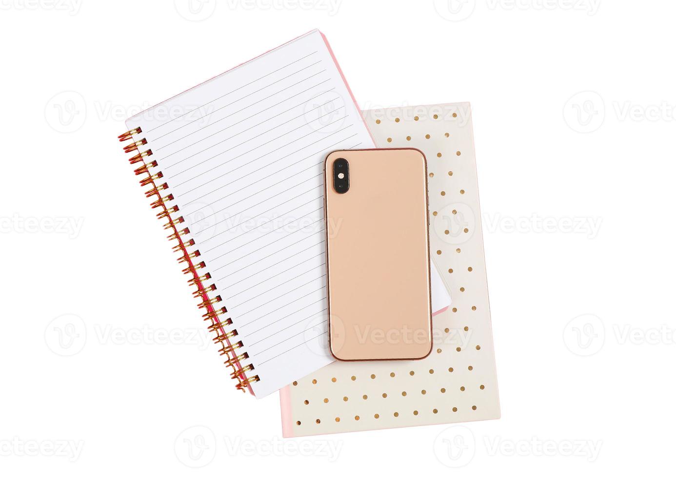 2116 Pink notebook and cellphone isolated on a transparent background photo